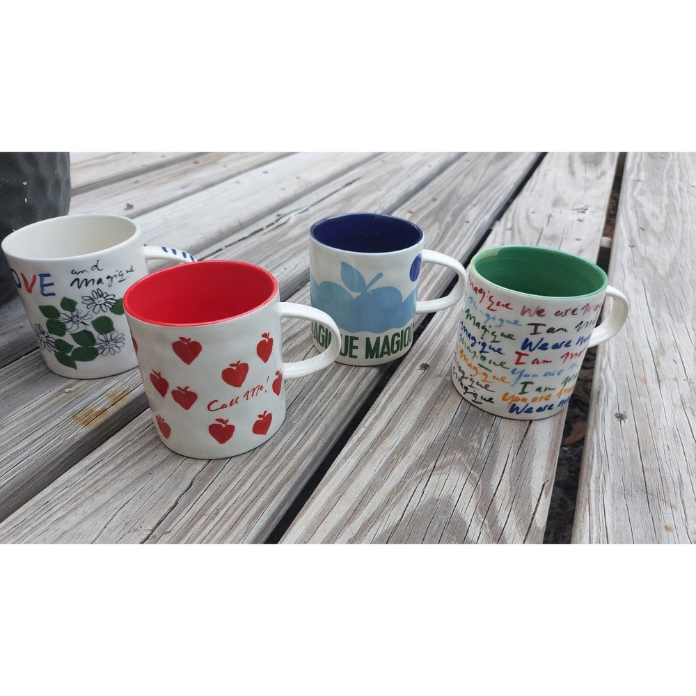 Anthropologie Hotel Le Magique Set of Four Mugs Inscribed Soleil Sunburst Design